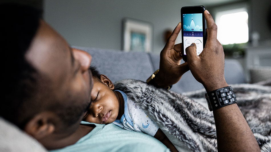 service provider baby sleeping with father