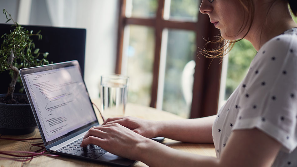 person typing on computer